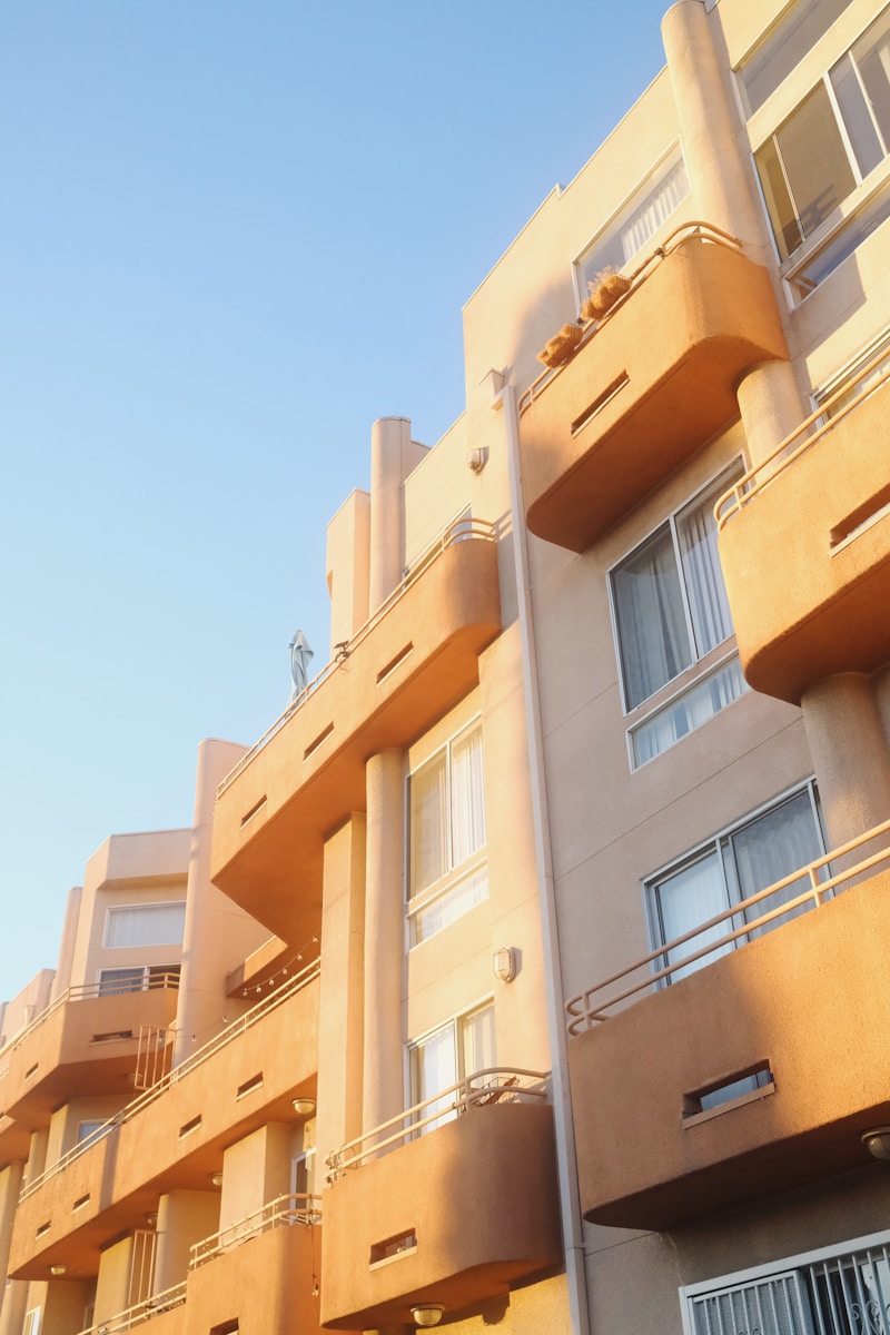 an apartment building with balconies and balconies on the balconies airbnb and homeowners insurance